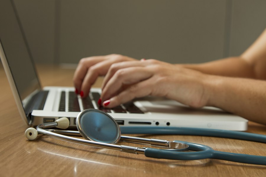 Clinician speaking with a patient